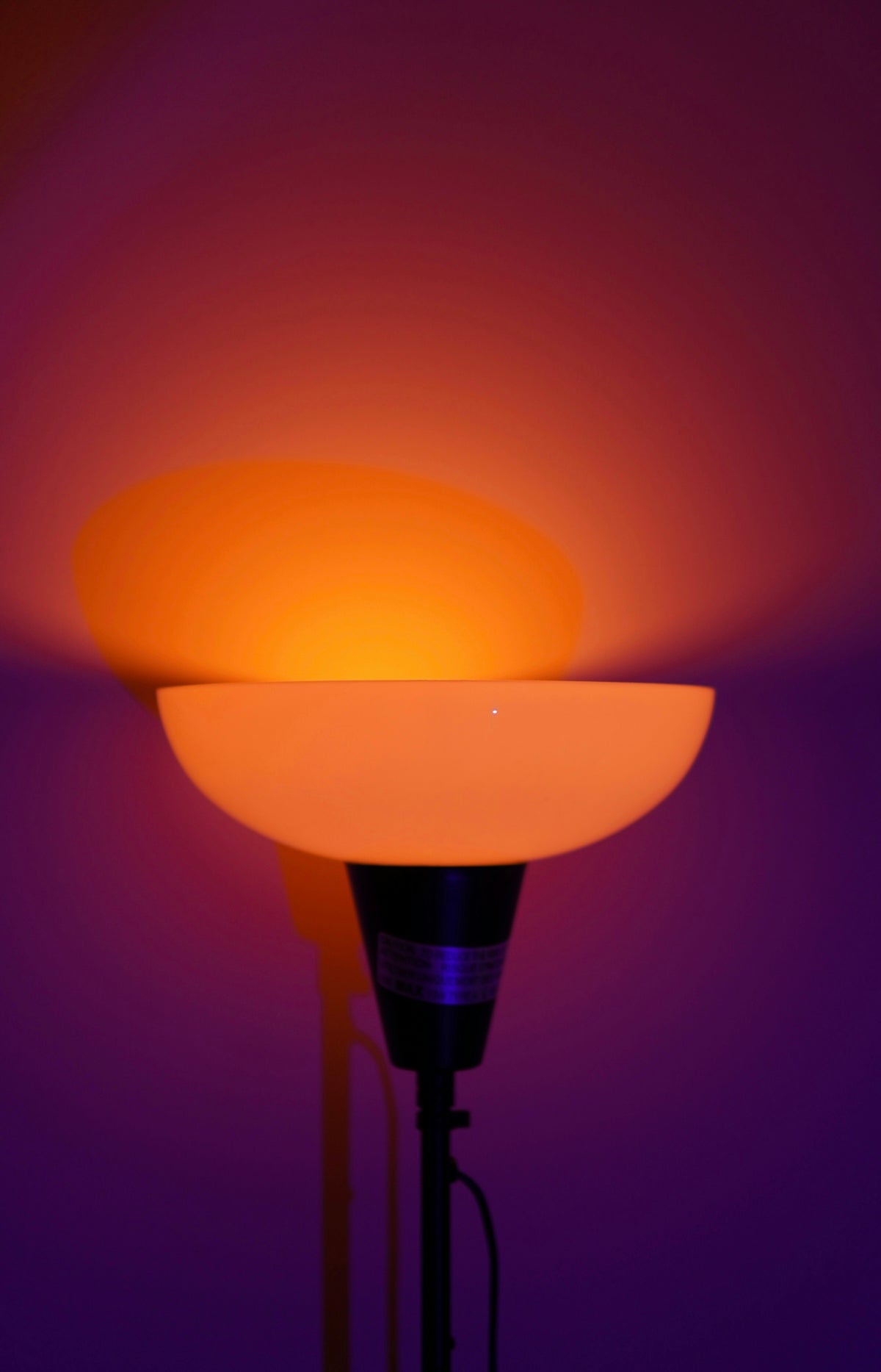 a lamp that is lit up in the dark